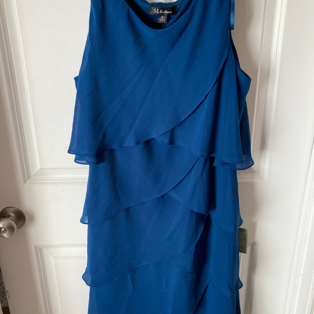 Fancy Sleeveless Dress/Rhinestone buttons on each shoulder.